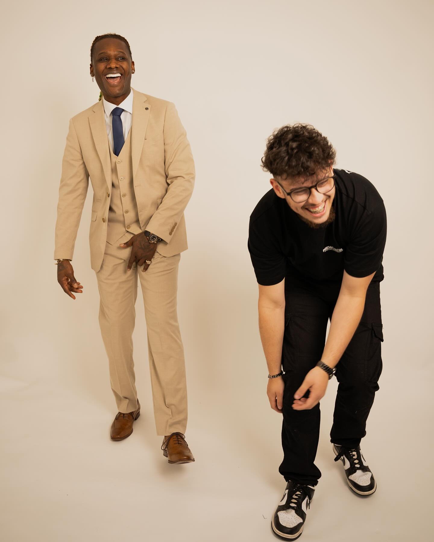 Two Alloy talent clients laughing in the studio